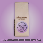 Kindheart Coffee Co. Friendly Wave Decaf Whole Bean coffee bag on an purple background with Dark Roast bubbles 4.5 out of 5 roast level.